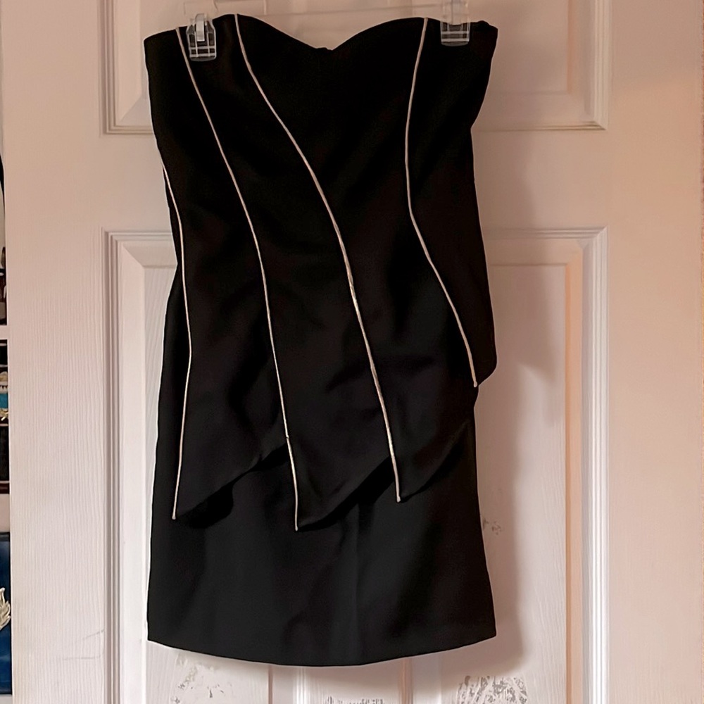 Size small. Black strapless dress with gold stripes. Worn once